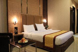M-One Hotel Batam Quarto foto